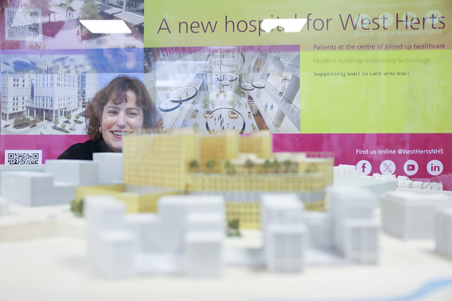 Secretary of state Vitoria Atkins looks at a model of the new hospital at Watford